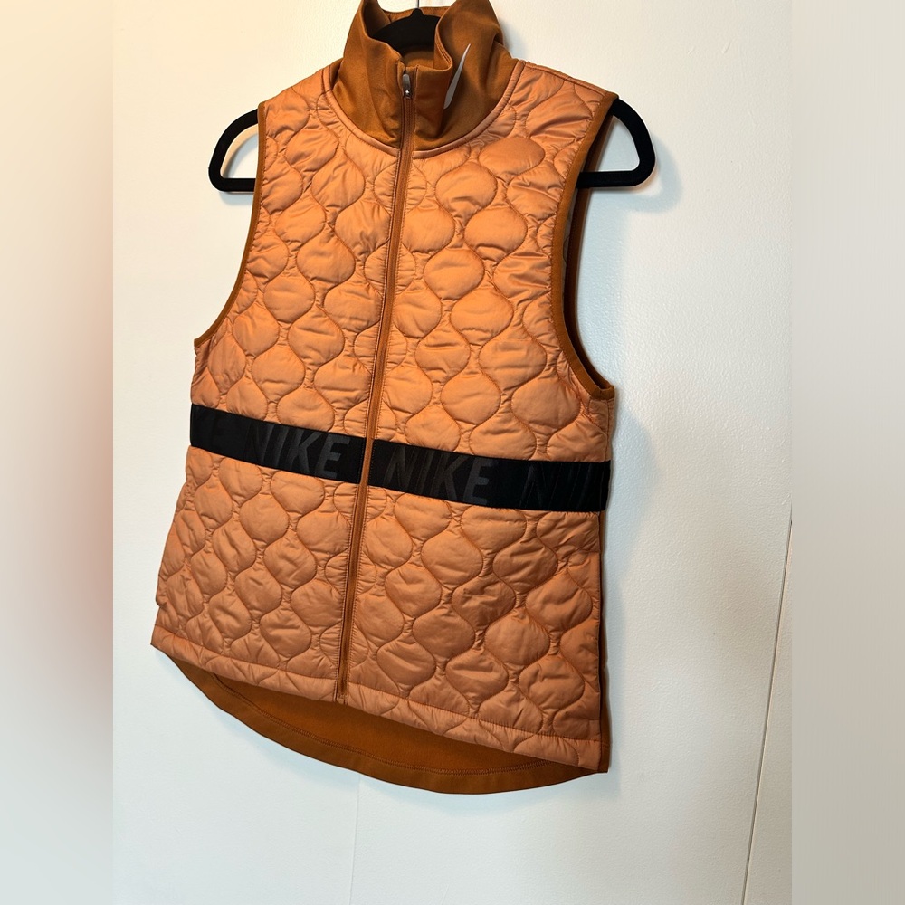 Nike gold vest